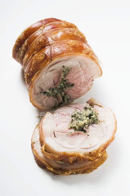 Rolled pork roasted with herb stuffing — Stock Photo