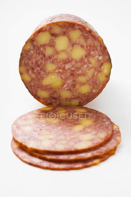 Cheese sausage partly sliced — Stock Photo