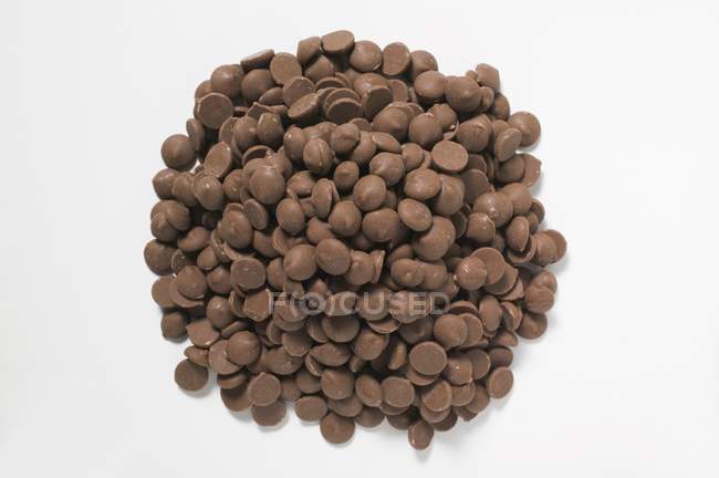 Heap of chocolate buttons — Stock Photo