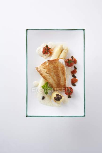 Fried zander fillet with cocktail tomatoes — Stock Photo