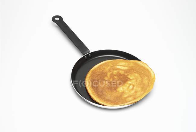 Pancake in a frying pan — Stock Photo