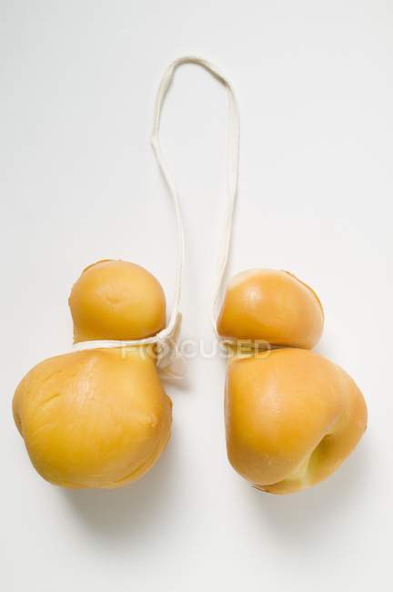 Two Provolone cheeses — Stock Photo