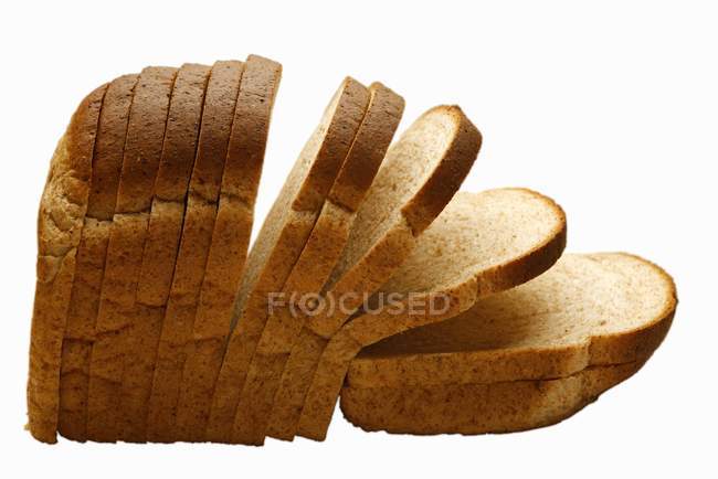 Sliced brown bread — Stock Photo