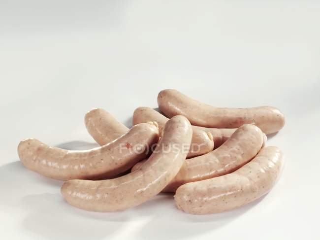 Raw veal sausages — Stock Photo