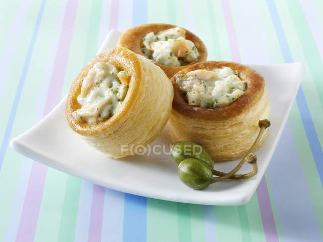 Closeup view of puff pastry cases with a savoury filling — Stock Photo