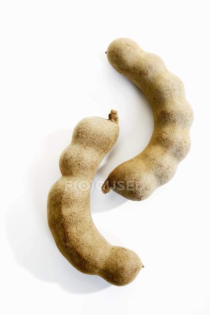 Two tamarinds on white — Stock Photo