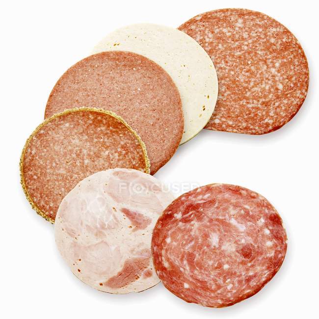 Slices of various types of sausages — Stock Photo