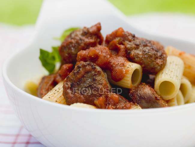 Rigatoni pasta with sausage — Stock Photo