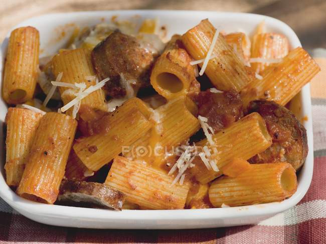 Rigatoni pasta with sausage and cheese — Stock Photo
