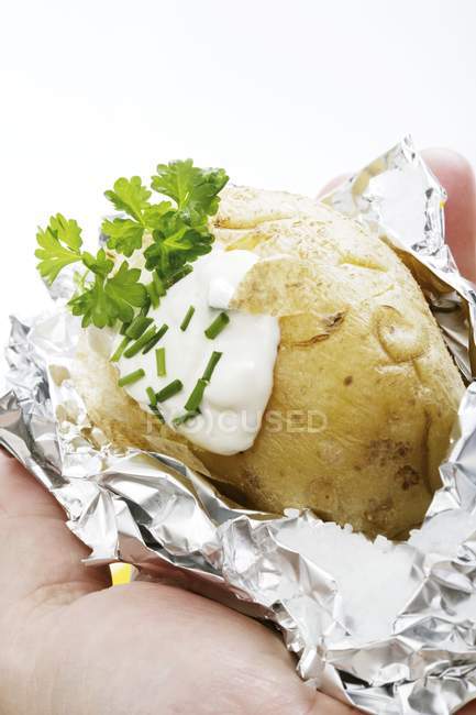 Baked potato with herb quark — Stock Photo