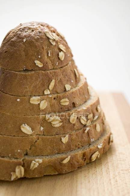 Bread on chopping board — Stock Photo