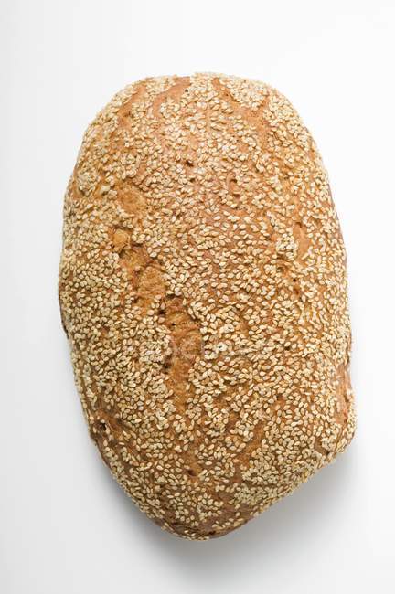 Whole loaf of sesame bread — Stock Photo