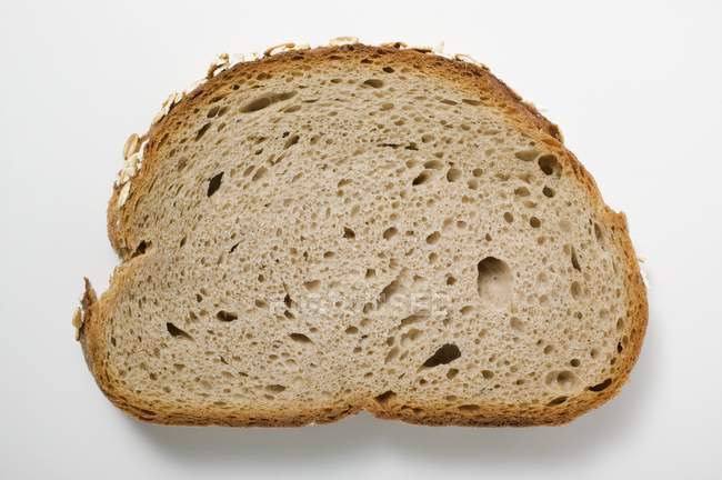 Slice of oat bread — Stock Photo