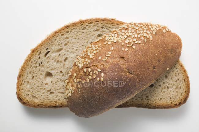 Slices of sesame bread — Stock Photo