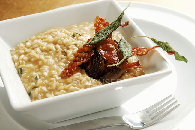 Risotto rice with bacon — Stock Photo