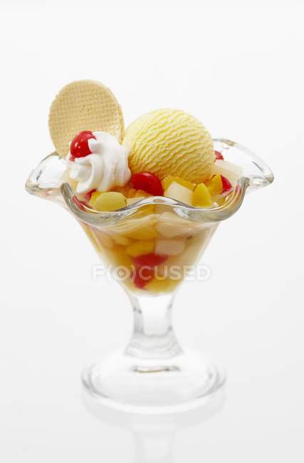 Fruit cocktail with ice cream — Stock Photo
