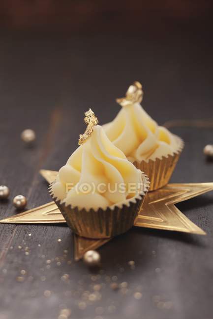 Confectionery decorated with gold leaf — Stock Photo