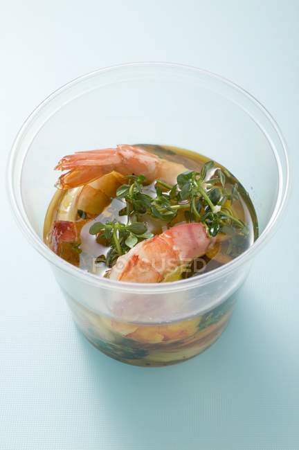 Prawns in olive oil with cress — Stock Photo