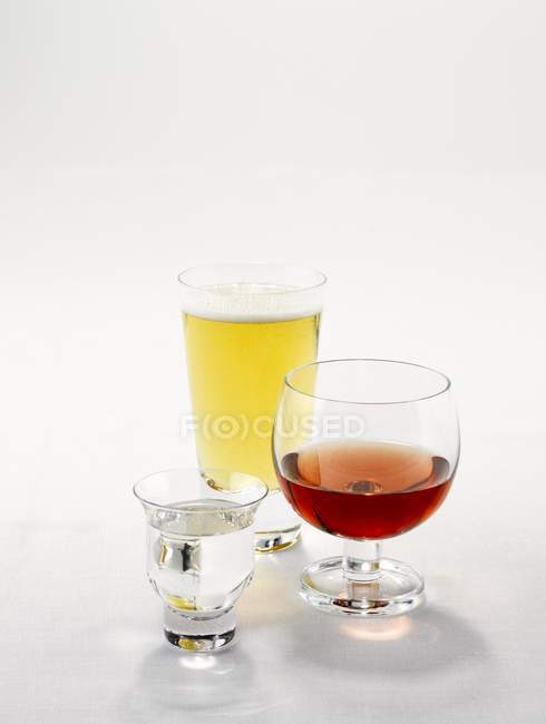 Wine and beer in glasses — Stock Photo