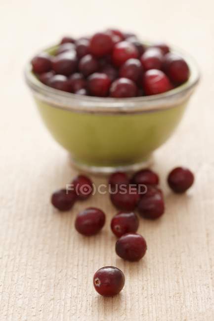 Fresh cranberries in bowl — Stock Photo