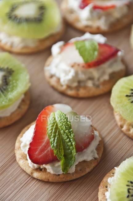 Crackers Topped with Cream Cheese — Stock Photo