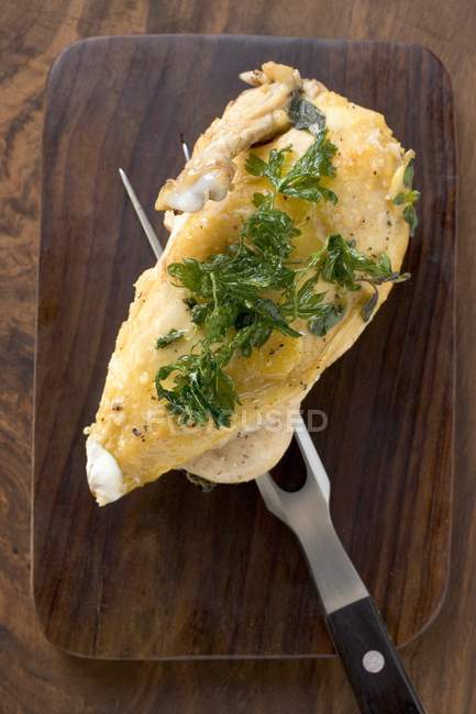 Chicken breast with deep-fried parsley — Stock Photo