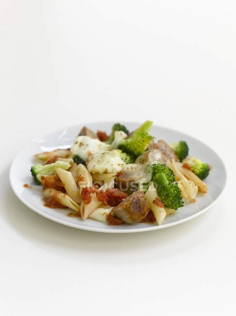 Penne pasta bake with sausages — Stock Photo