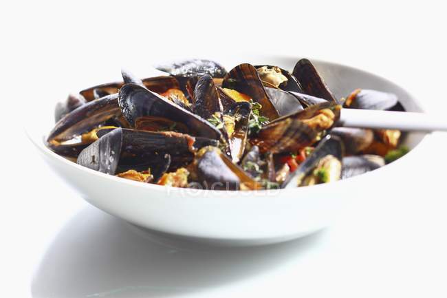 Steamed mussels with herbs — Stock Photo