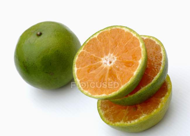 Fresh green tangerines — Stock Photo