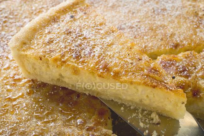 Partly sliced Caramel tart — Stock Photo