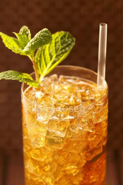 Closeup view of mint Julep in a glass with straw and mint garnish — Stock Photo