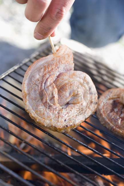 Raw Pork on barbecue grill rack — Stock Photo