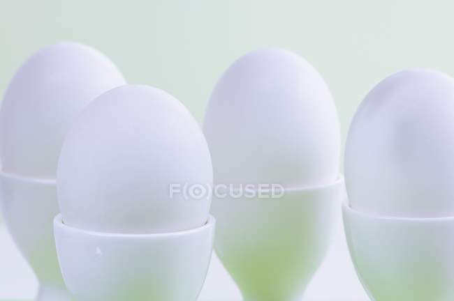 Eggs in egg cups — Stock Photo