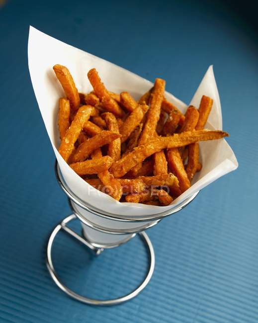 Sweet potato fries in paper cone — Stock Photo