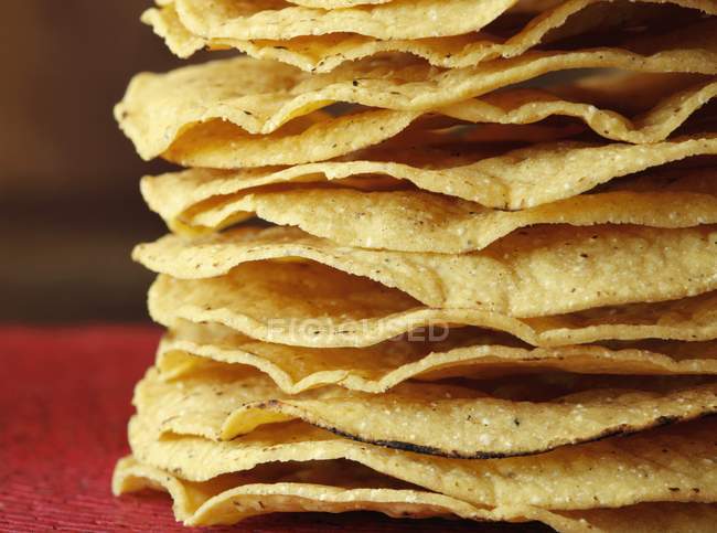 Closeup view of stacked fried Tostadas — Stock Photo
