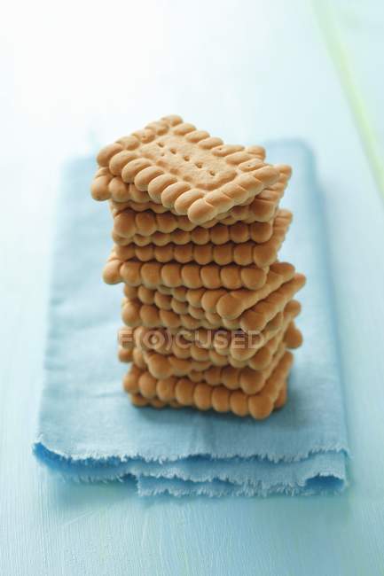 Stack of biscuits on napkin — Stock Photo