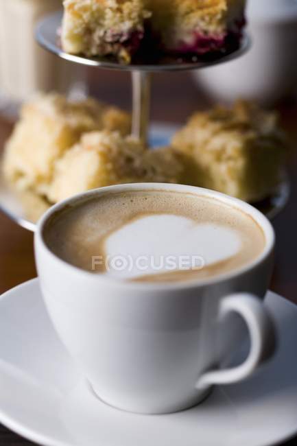 Cappuccino decorated with a heart — Stock Photo