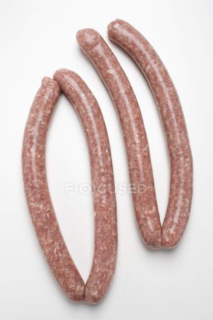 Salsichas de porco em bruto — Fotografia de Stock