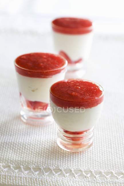 Halva mousse with strawberry sauce — Stock Photo