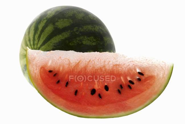 Fresh watermelon with slice — Stock Photo