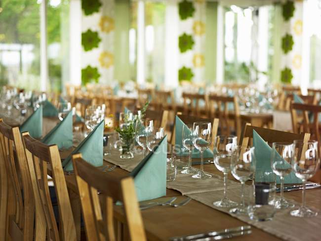 Daytime view of laid tables in a restaurant — Stock Photo