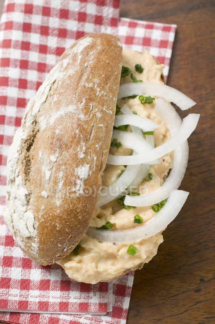 Bread roll with Obatzda — Stock Photo