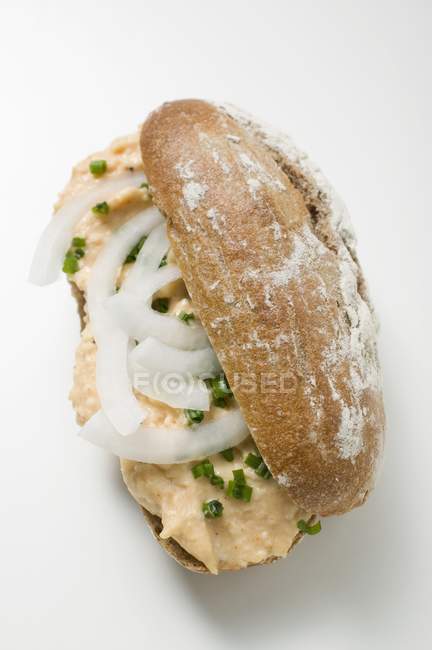 Bread roll with Obatzda — Stock Photo