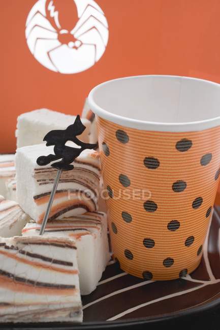 Marshmallows for Halloween with witch — Stock Photo