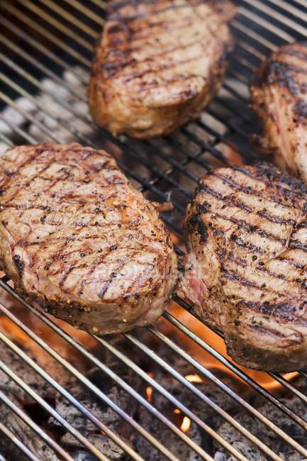 Several beef steaks — Stock Photo