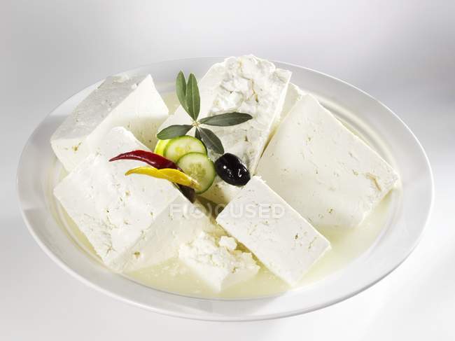 Vários pedaços de queijo feta — Fotografia de Stock