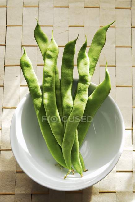 Fresh green Climbing beans in bowl — Stock Photo