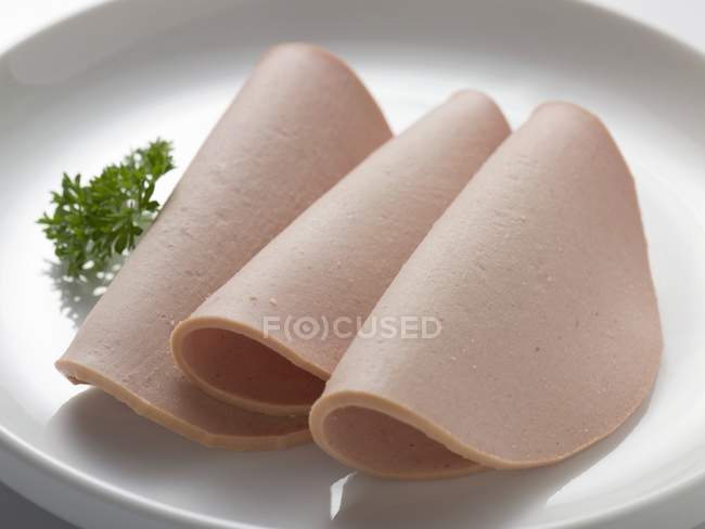 Slices of Gelbwurst pork and veal sausage — Stock Photo
