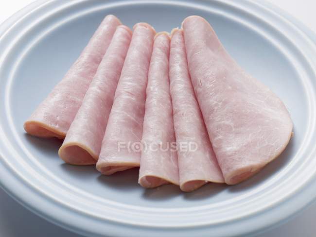 Several slices of ham — Stock Photo