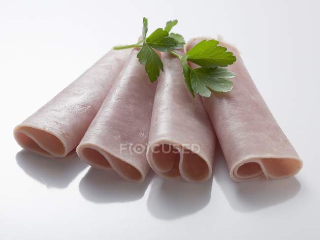 Ham rolls garnished with parsley — Stock Photo